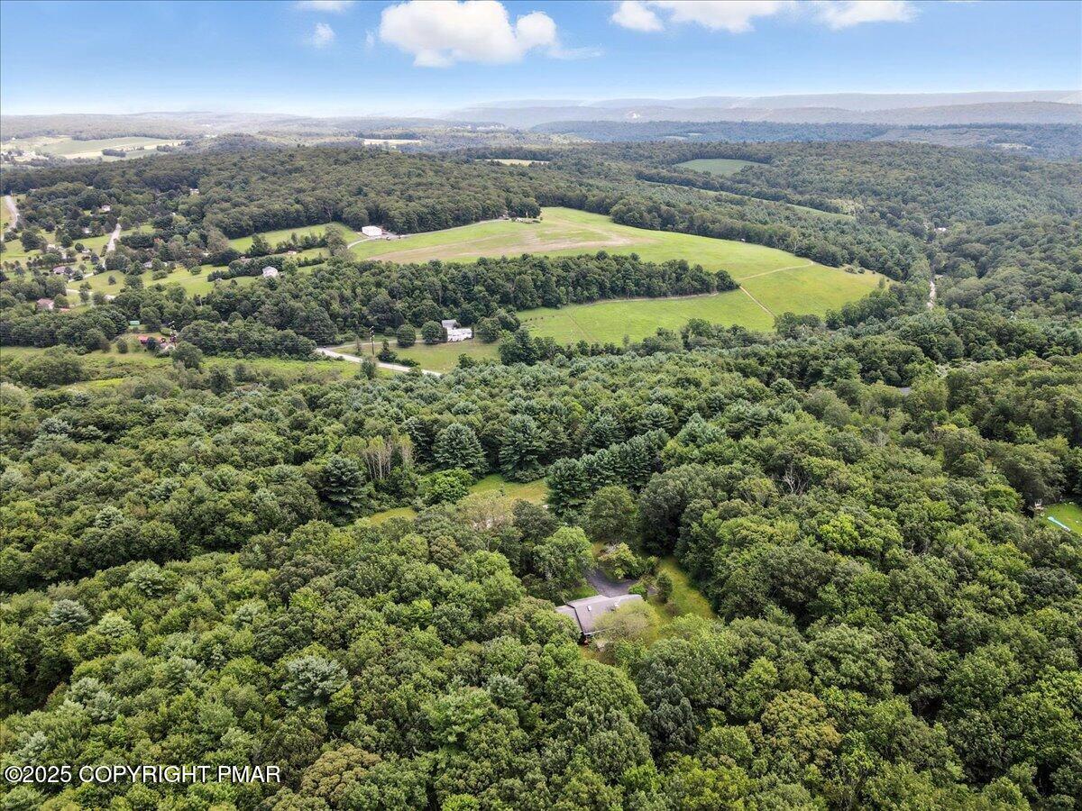 142 Pine Grove Road Kunkletown, PA 18058 - Photo 75 of 78 an aerial view of residential houses with outdoor space and lake view