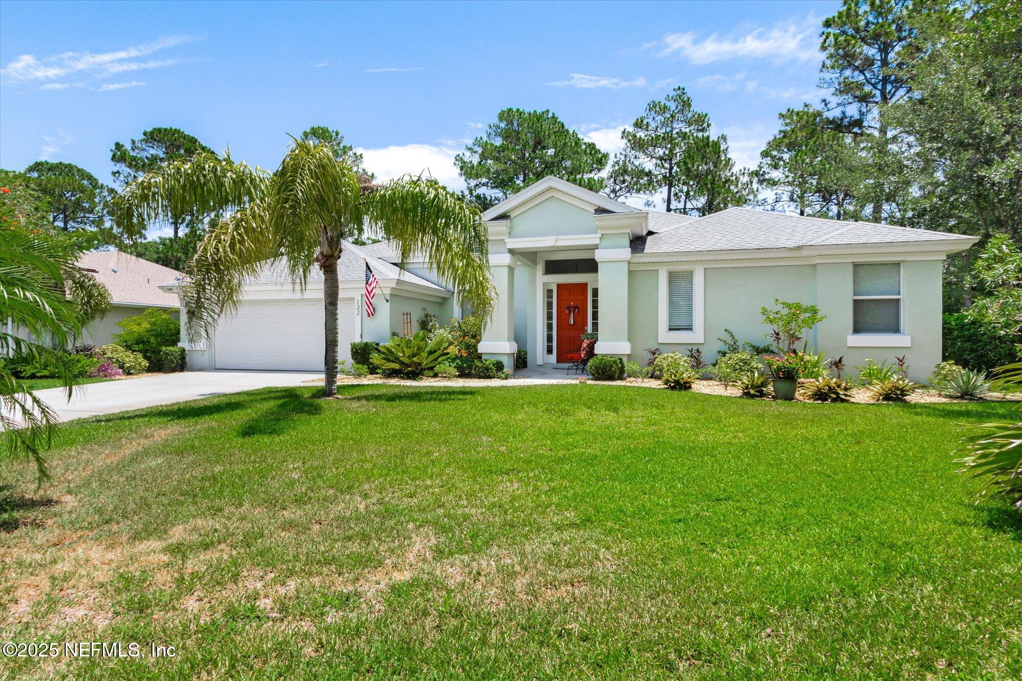 132 Bottlebrush Drive St. Augustine, FL 32086 - Photo 39 of 56 a front view of house with yard and green space