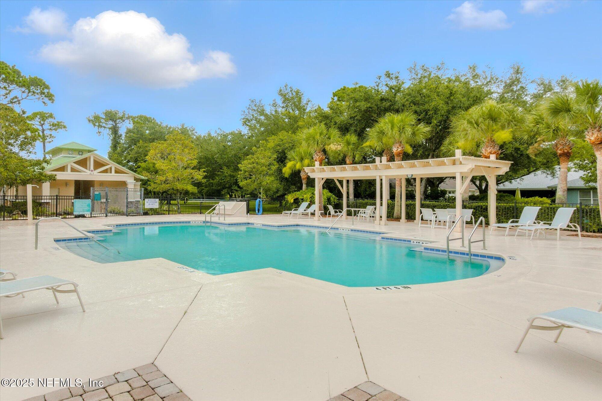 132 Bottlebrush Drive St. Augustine, FL 32086 - Photo 50 of 56 a view of a house with a swimming pool
