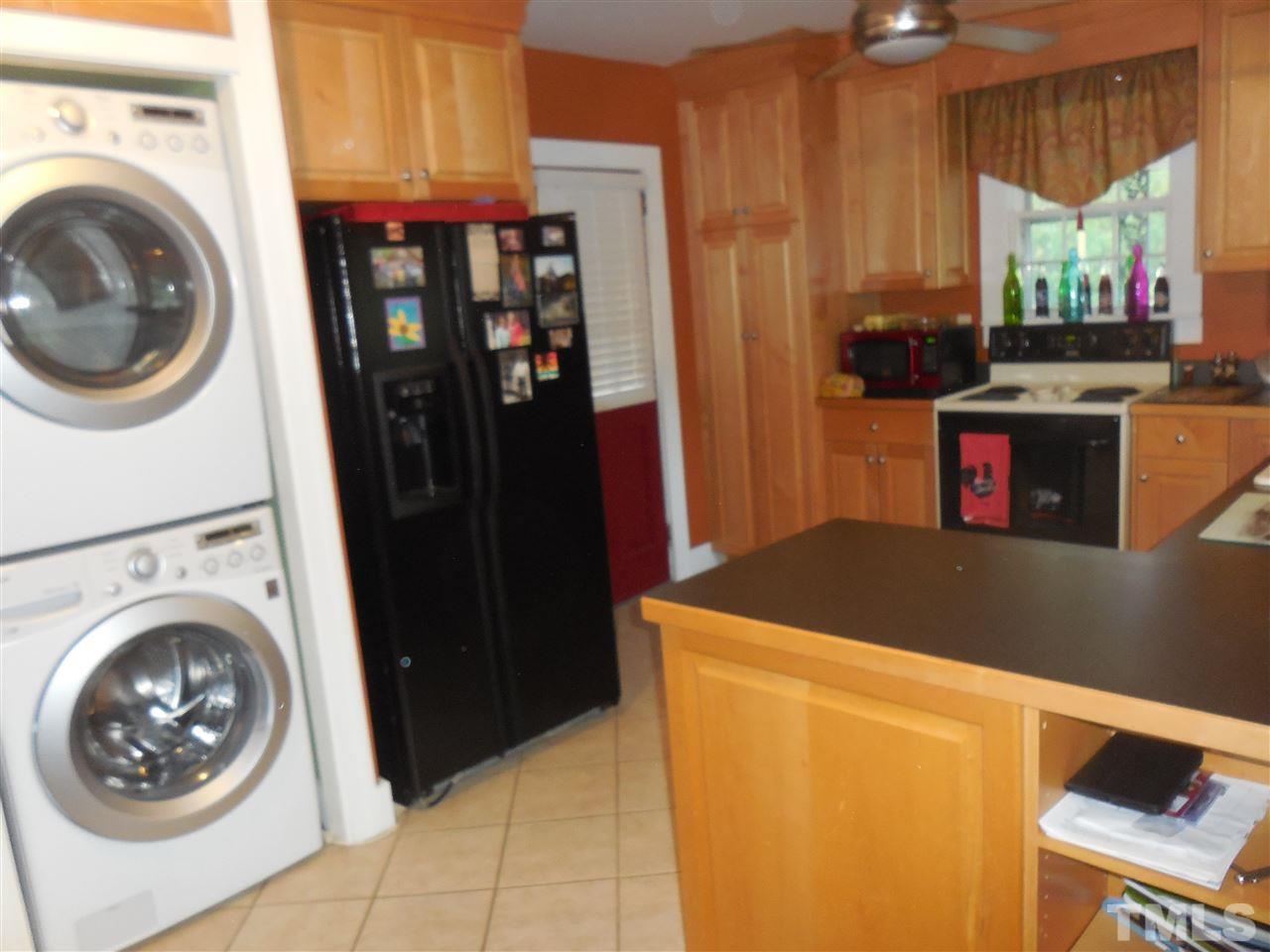 2150 Sanders Road Stem, NC 27581 - Photo 5 of 13 a utility room with dryer and washer