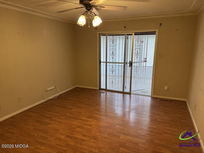 309 North Pleasant Hill Road Warner Robins, GA 31093 - Photo 6 of 23 a view of an empty room with a window