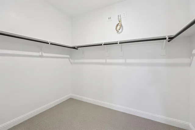 a view of a room with racks on the wall