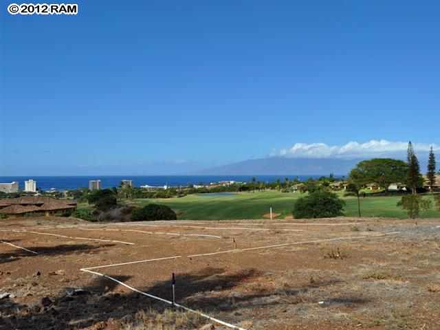 44 Anapuni Loop, Unit 3 Lahaina, HI 96761 - Photo 16 of 18 a view of a lake and sunset