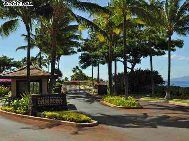 44 Anapuni Loop, Unit 3 Lahaina, HI 96761 - Photo 18 of 18 a front view of a house with garden