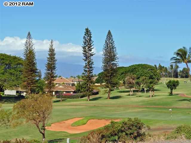 44 Anapuni Loop, Unit 3 Lahaina, HI 96761 - Photo 4 of 18 a view of a golf course with a lake view