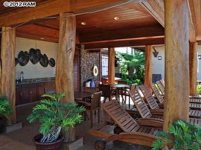 44 Anapuni Loop, Unit 3 Lahaina, HI 96761 - Photo 8 of 18 a view of a porch with chairs and potted plants