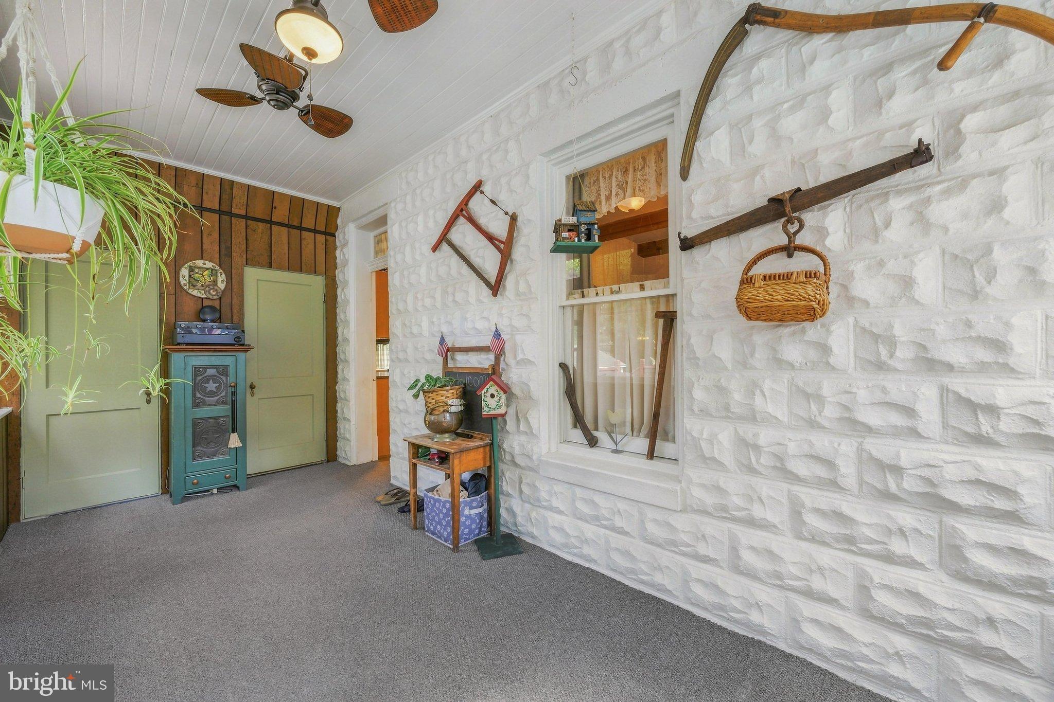 522 Old Hammonds Ferry Road Linthicum Heights, MD 21090 - Photo 22 of 109 Charming entryway with rustic decor accents.