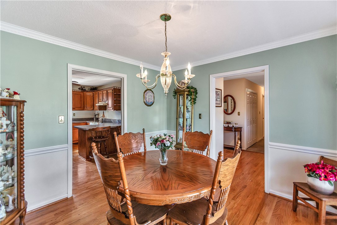 1116 Green Willow Trail Anderson, SC 29621 - Photo 17 of 45 This inviting dining area seamlessly connects to the kitchen, creating an ideal space for gatherings.