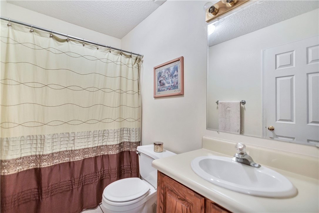1116 Green Willow Trail Anderson, SC 29621 - Photo 22 of 45 This bathroom features a functional vanity with ample counter space and a classic shower.