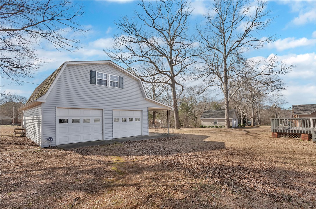 1116 Green Willow Trail Anderson, SC 29621 - Photo 24 of 45 This spacious garage building features ample storage and a charming exterior.
