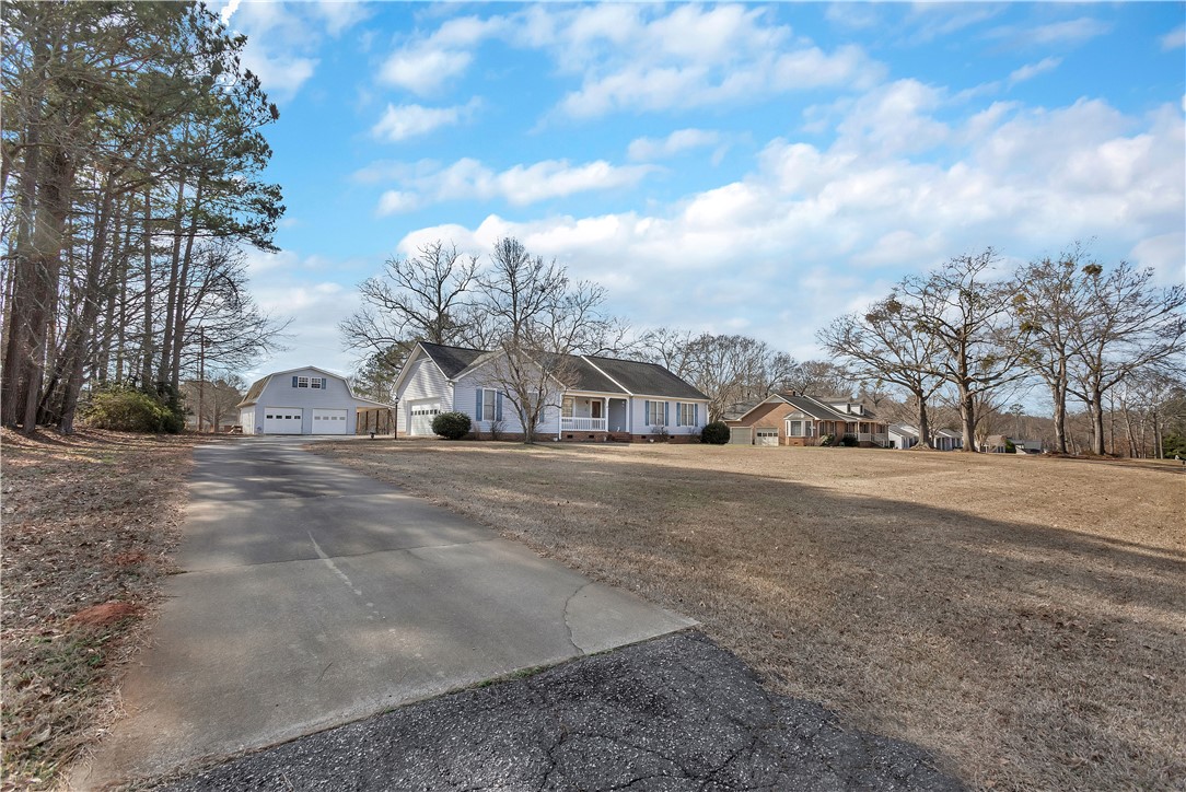 1116 Green Willow Trail Anderson, SC 29621 - Photo 3 of 45 This charming home offers a sprawling yard and ample parking, ideal for outdoor enjoyment.