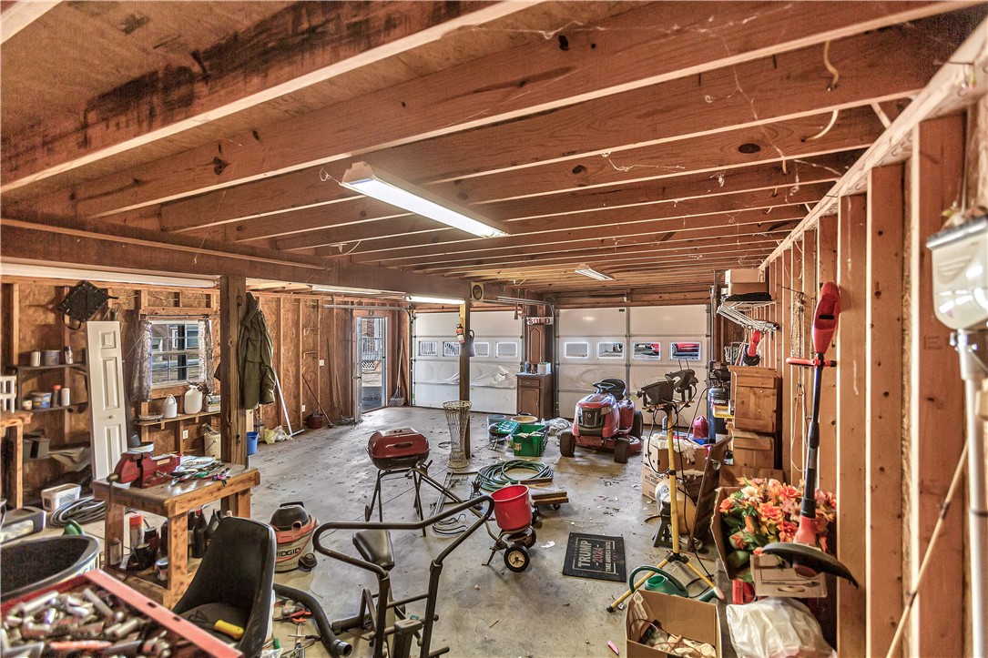 1116 Green Willow Trail Anderson, SC 29621 - Photo 32 of 45 This spacious garage offers ample room for vehicles and projects.