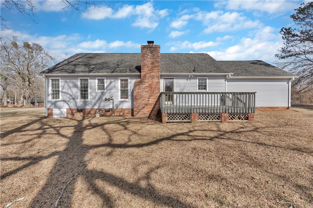 1116 Green Willow Trail Anderson, SC 29621 - Photo 35 of 45 This charming home offers a spacious deck and a classic brick chimney.
