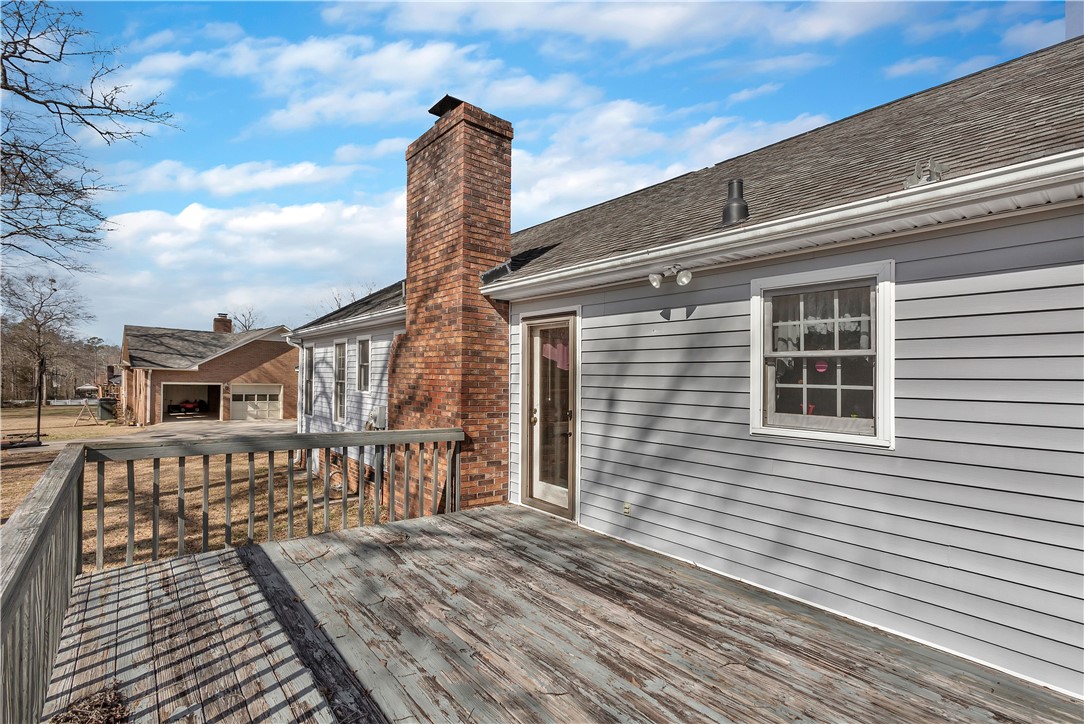 1116 Green Willow Trail Anderson, SC 29621 - Photo 36 of 45 This spacious wooden deck offers abundant outdoor living space and serene views.