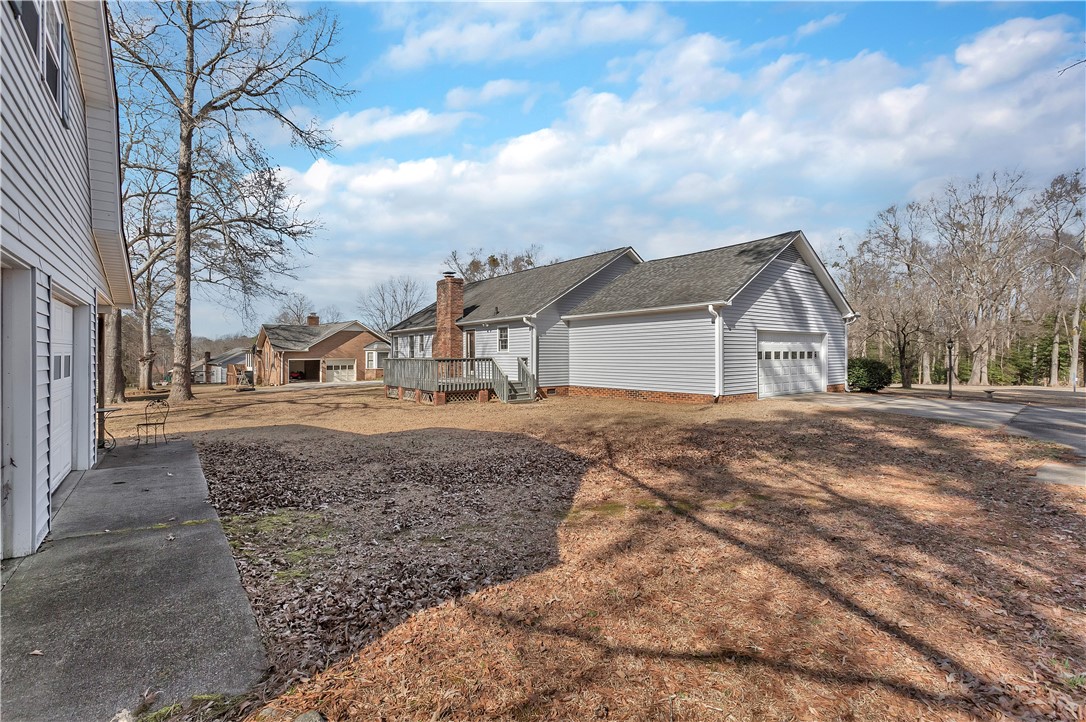 1116 Green Willow Trail Anderson, SC 29621 - Photo 37 of 45 This expansive property features a well-maintained exterior and ample parking, offering comfort and convenience.