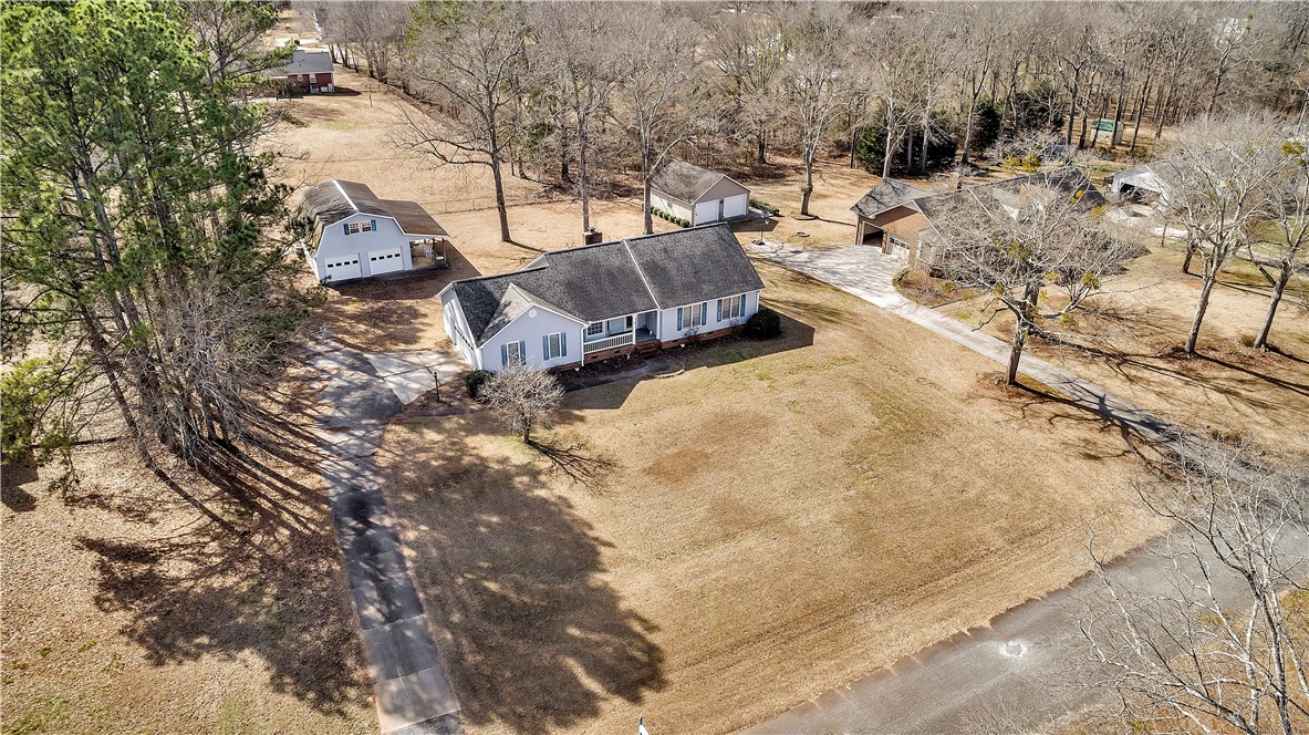1116 Green Willow Trail Anderson, SC 29621 - Photo 39 of 45 This charming home features a classic ranch style with multiple outbuildings, offering ample space and potential.