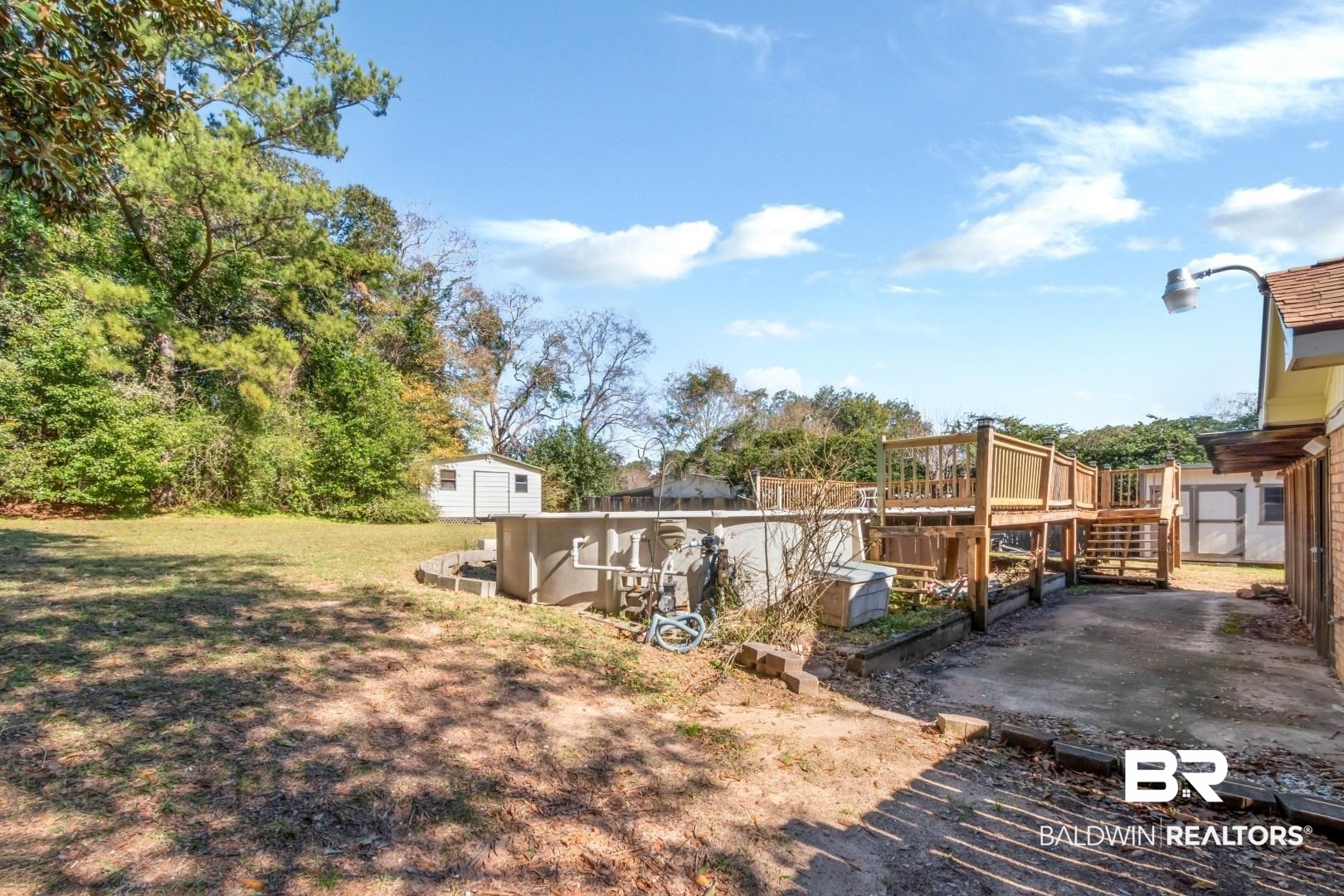 8304 Champlain Circle Mobile, AL 36695 - Photo 40 of 46 View of yard featuring a storage shed