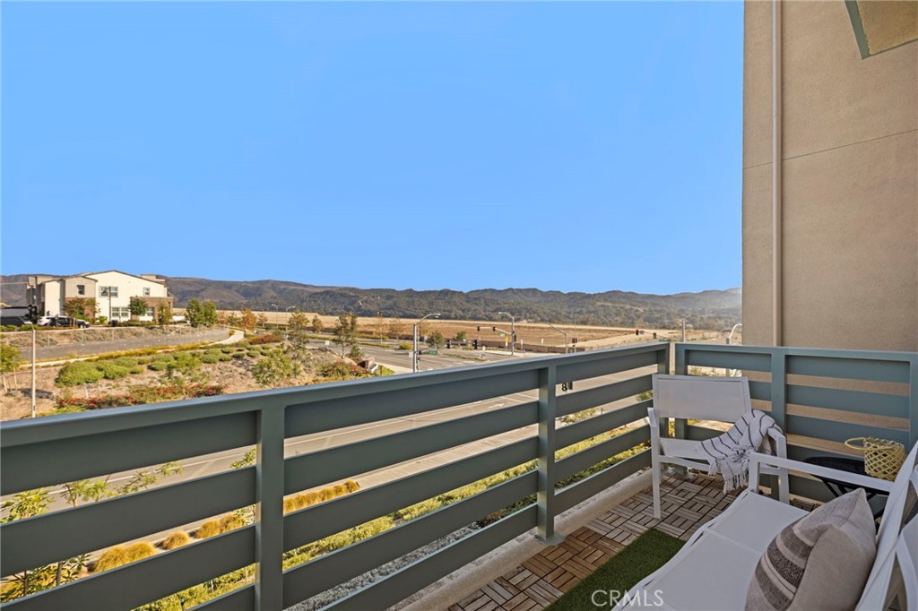 126 Stetson Street Rancho Mission Viejo, CA 92694 - Photo 11 of 31 balcony off living room and views!