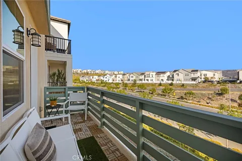 a bathroom with a tub sink shower and mirror