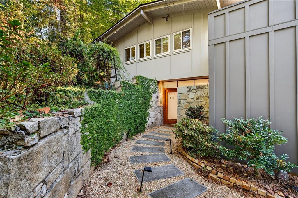 a house view with a garden space