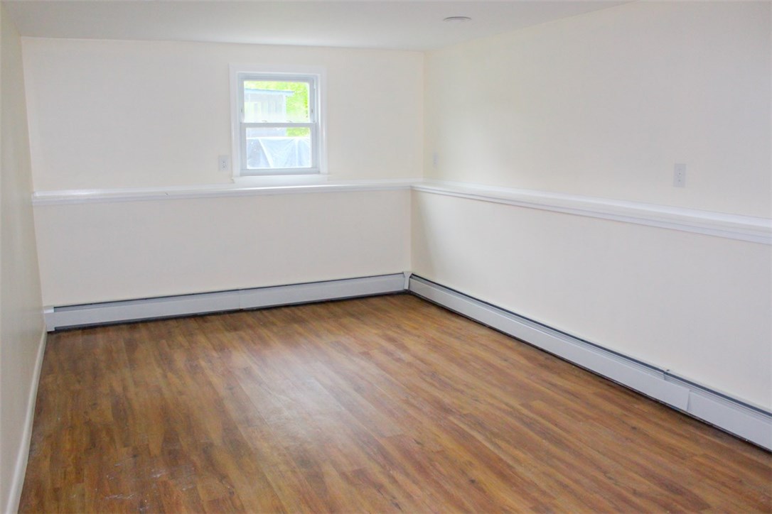 43 Overhill Road Warren, RI 02885 - Photo 16 of 21 An expansive Bonus Room offers limitless possibilities, including space for an In-Law, Play Room, Gym, Office, etc.