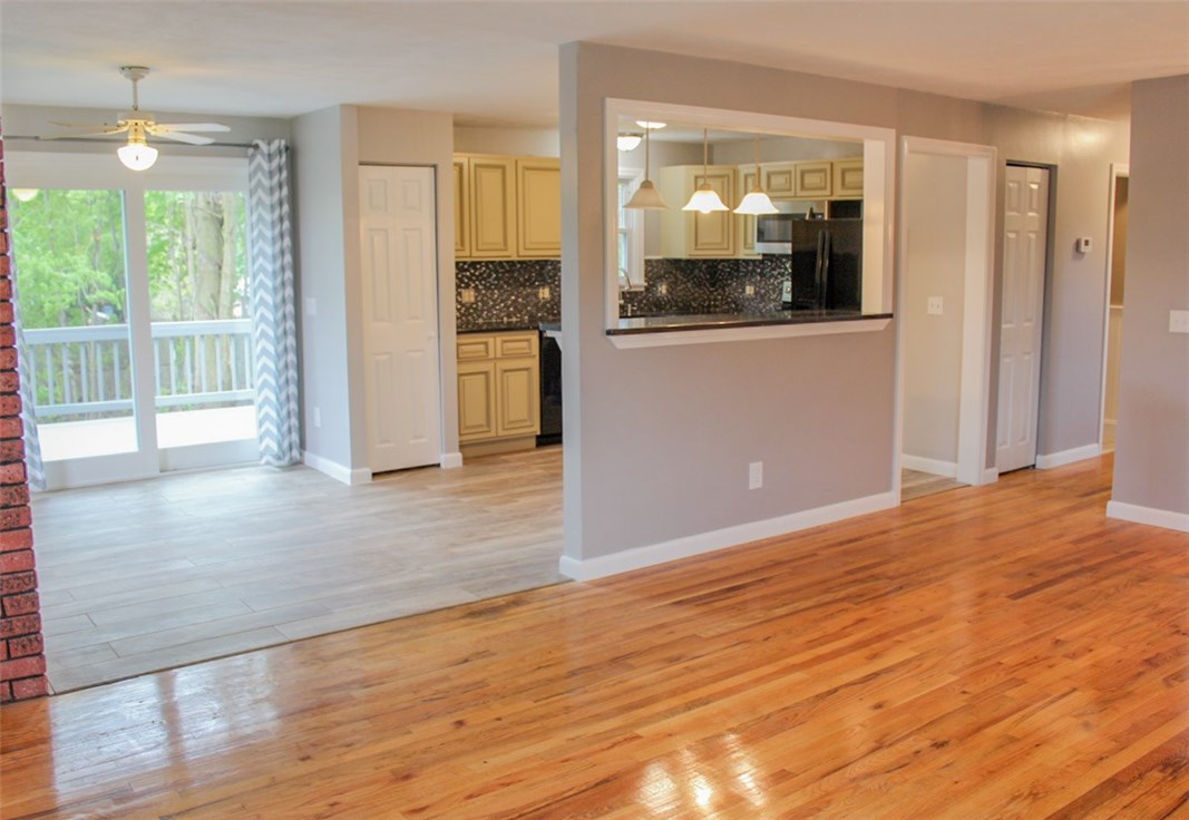 43 Overhill Road Warren, RI 02885 - Photo 21 of 21 The open floor plan is evident in this view from the Living Room, looking into the Kitchen & Dining Room.