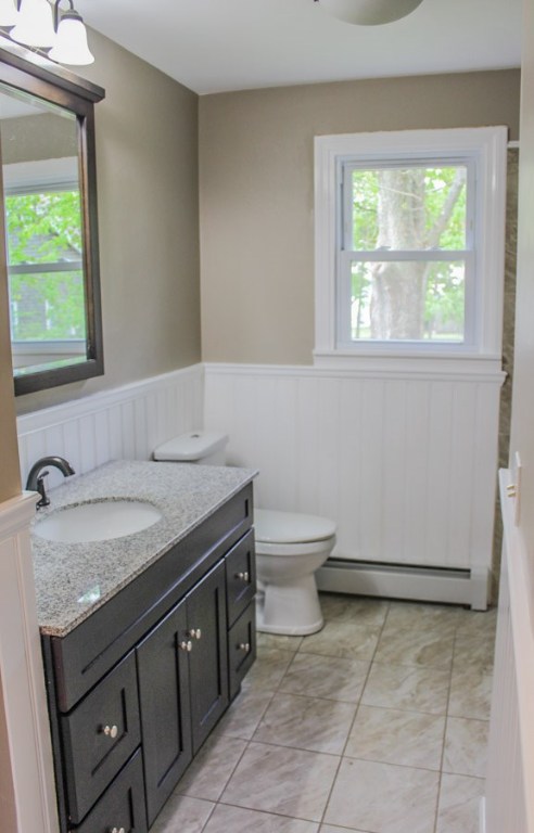 43 Overhill Road Warren, RI 02885 - Photo 8 of 21 The baths of this home are incredible. This upstairs bath boasts a new vanity, mirror, lighting & more.