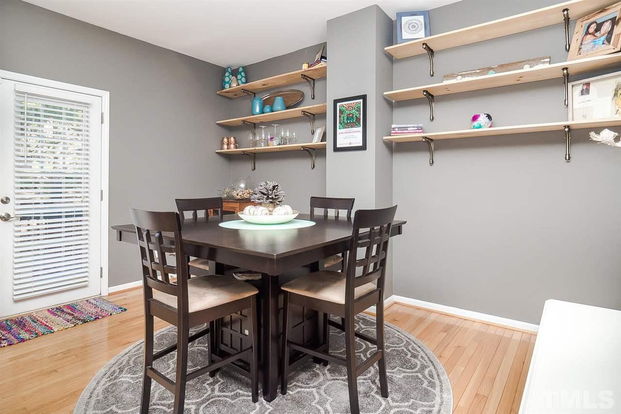 4714 Longhill Lane Raleigh, NC 27612 - Photo 8 of 19 a view of a dining room with furniture