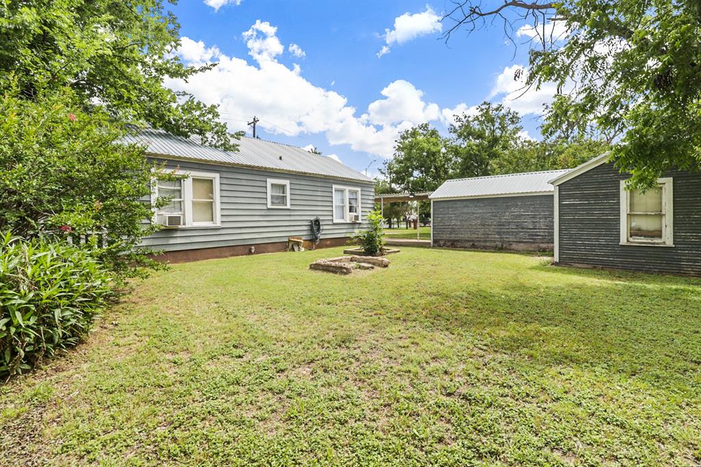 605 West Walnut Street Coleman, TX 76834 - Photo 14 of 18 a house view with a garden space