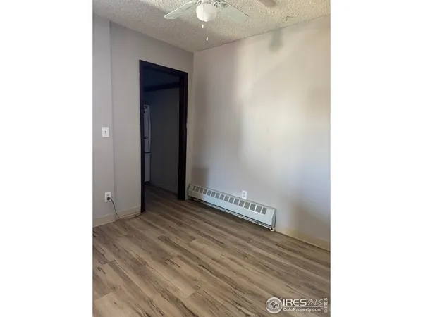 a view of a hallway with closet