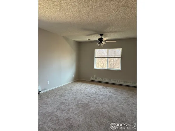 a view of a livingroom with a window
