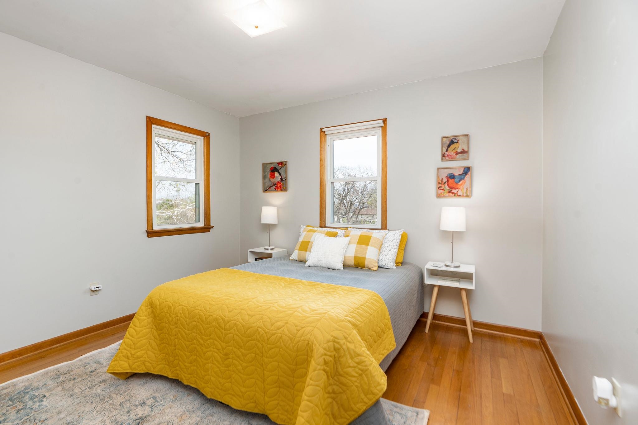 2209 3rd Street Staunton, VA 24401 - Photo 11 of 35 a bed sitting in a bedroom next to a window