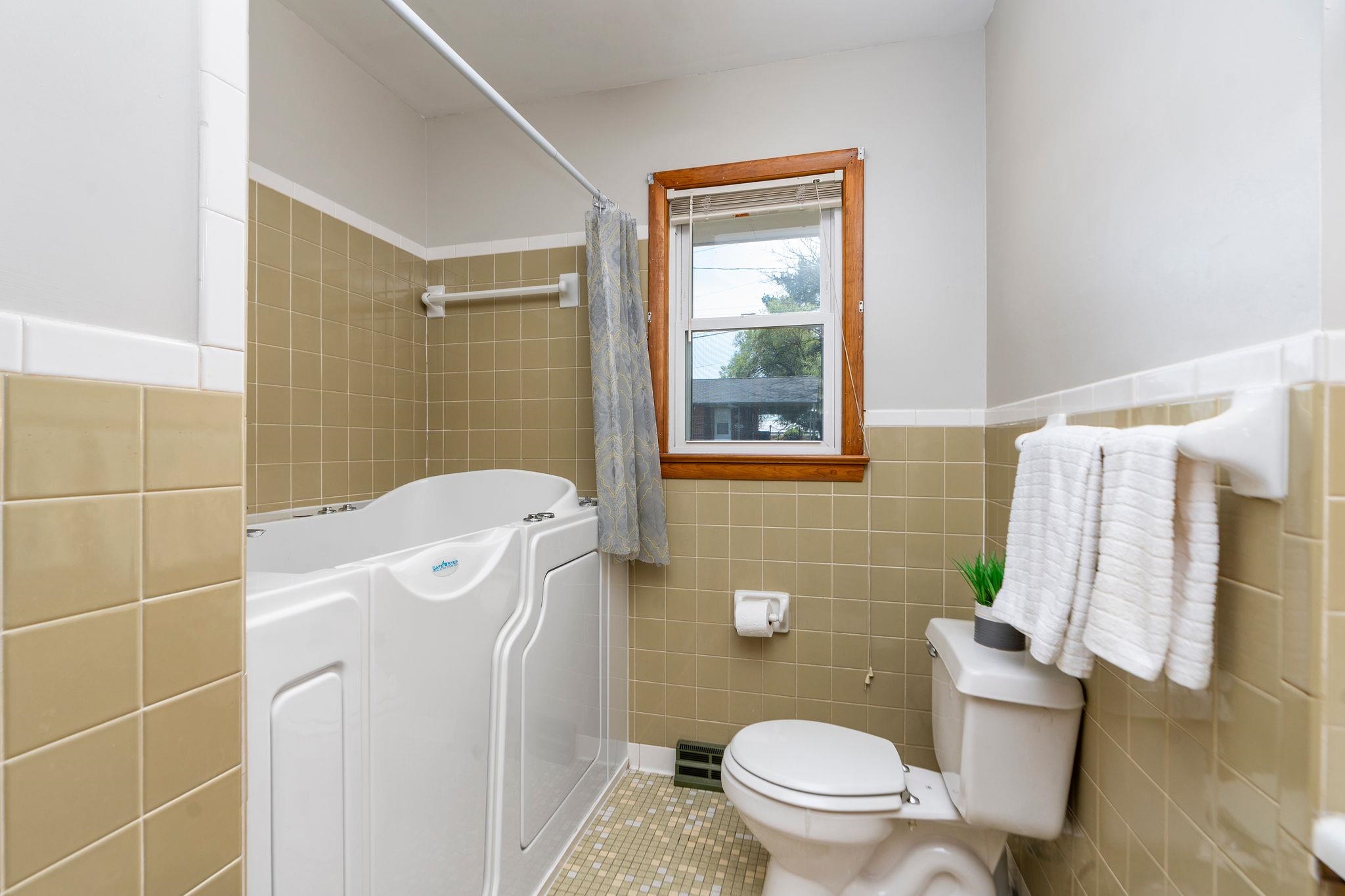 2209 3rd Street Staunton, VA 24401 - Photo 15 of 35 a bathroom with a toilet and a shower