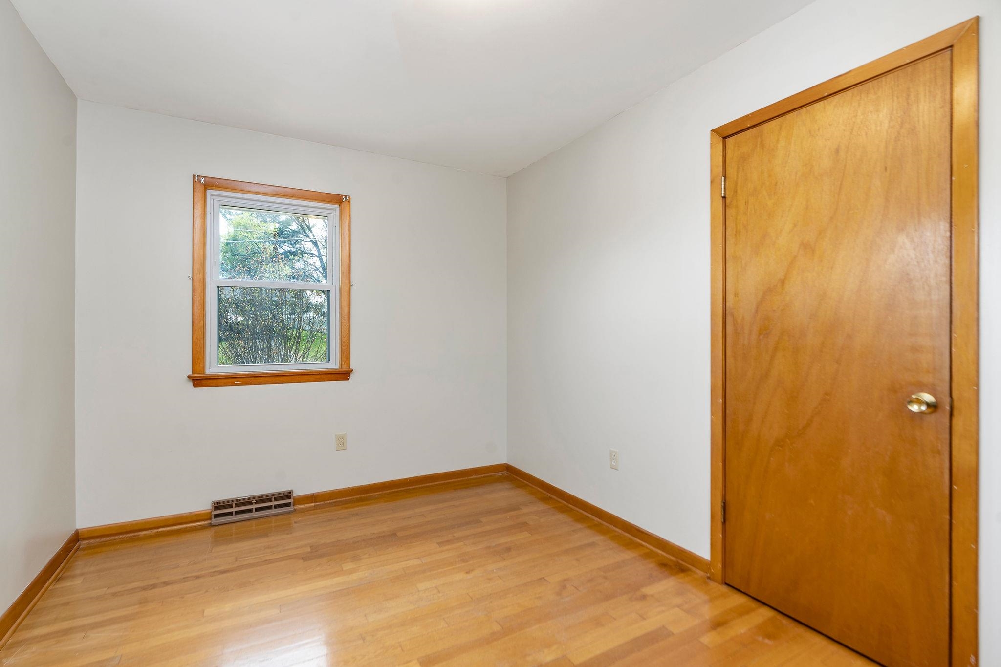 2209 3rd Street Staunton, VA 24401 - Photo 19 of 35 a view of an empty room with a window
