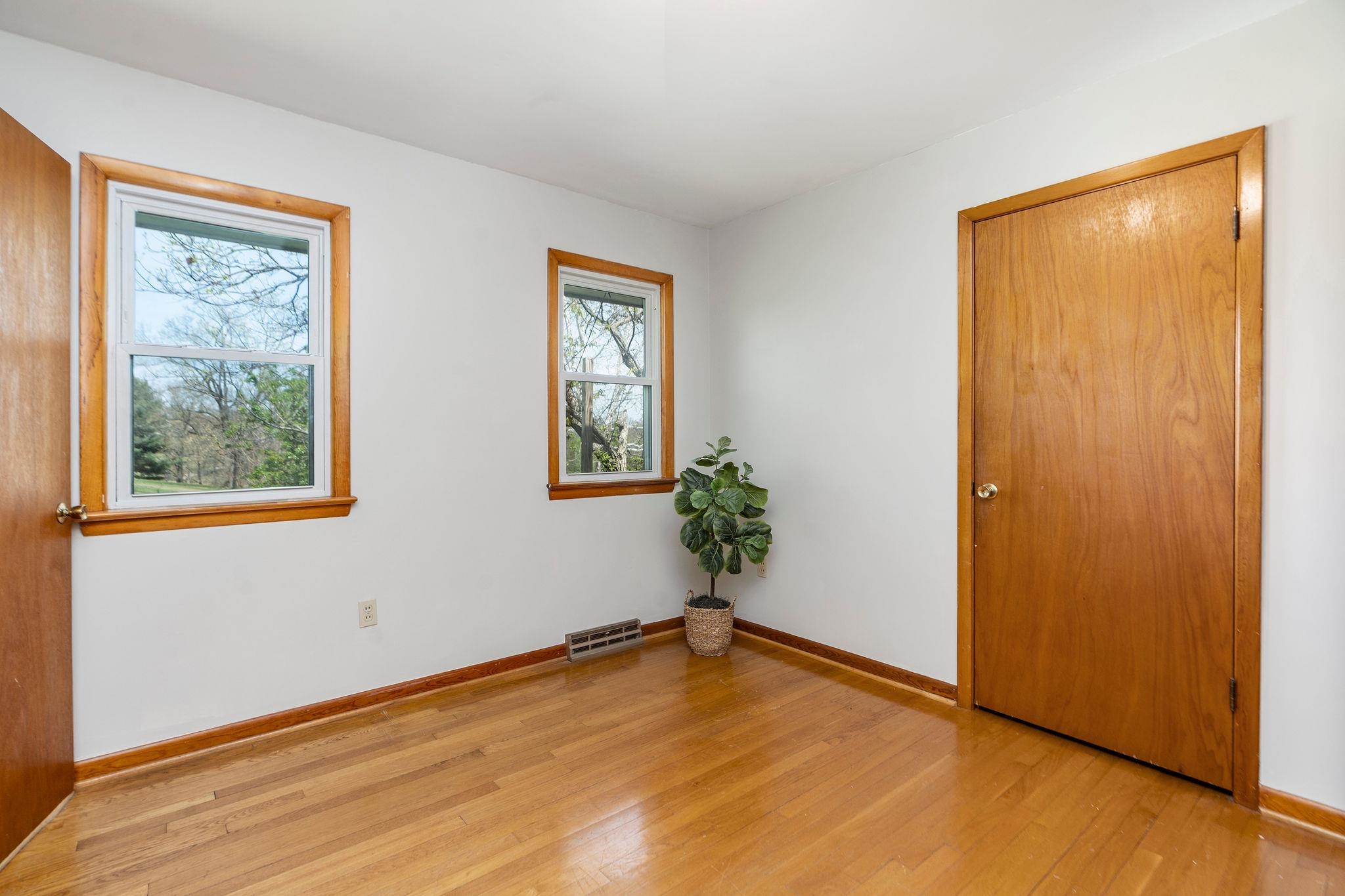 2209 3rd Street Staunton, VA 24401 - Photo 20 of 35 a view of empty room with wooden floor and fan