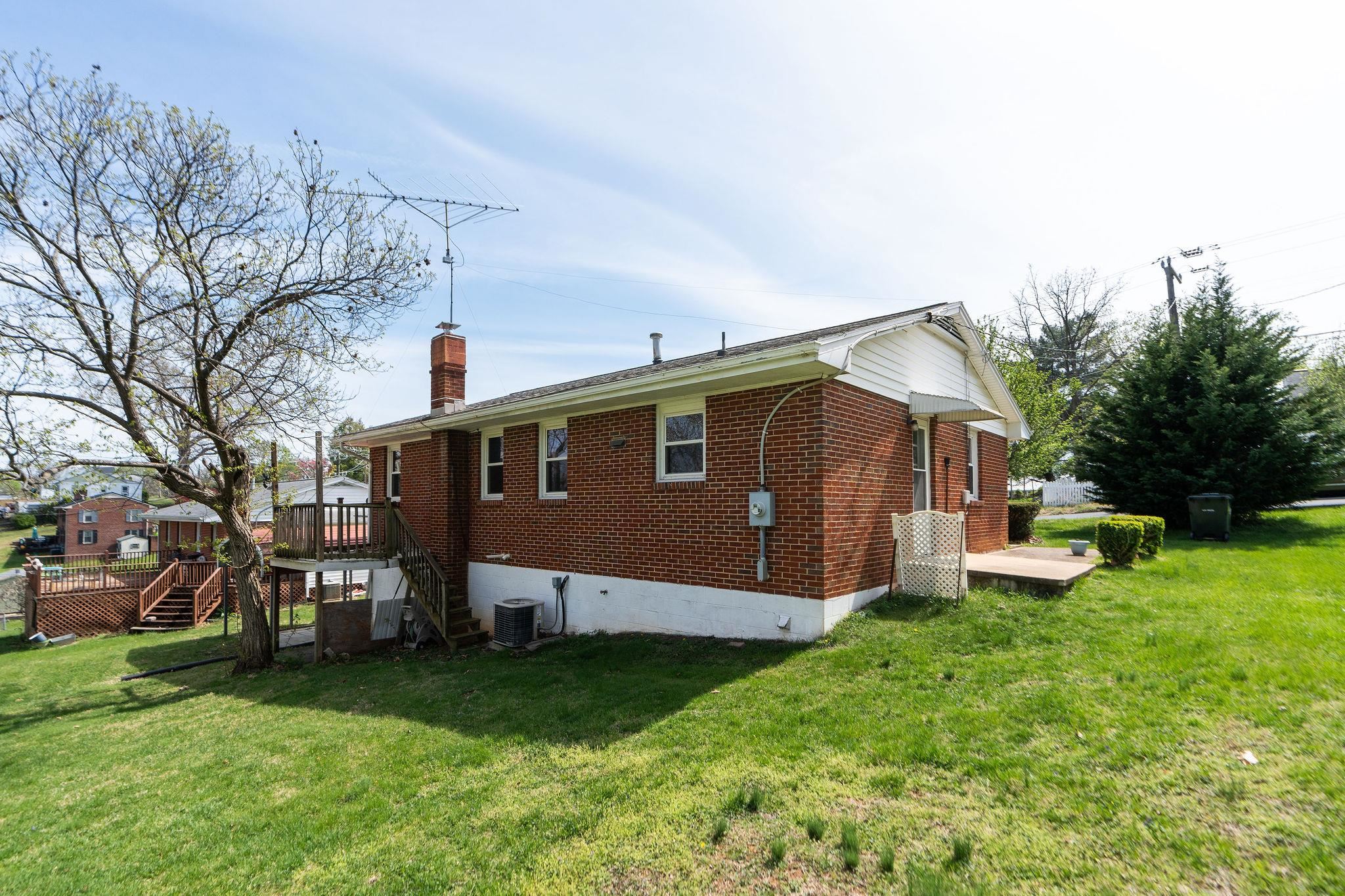 2209 3rd Street Staunton, VA 24401 - Photo 29 of 35 a front view of a house with garden