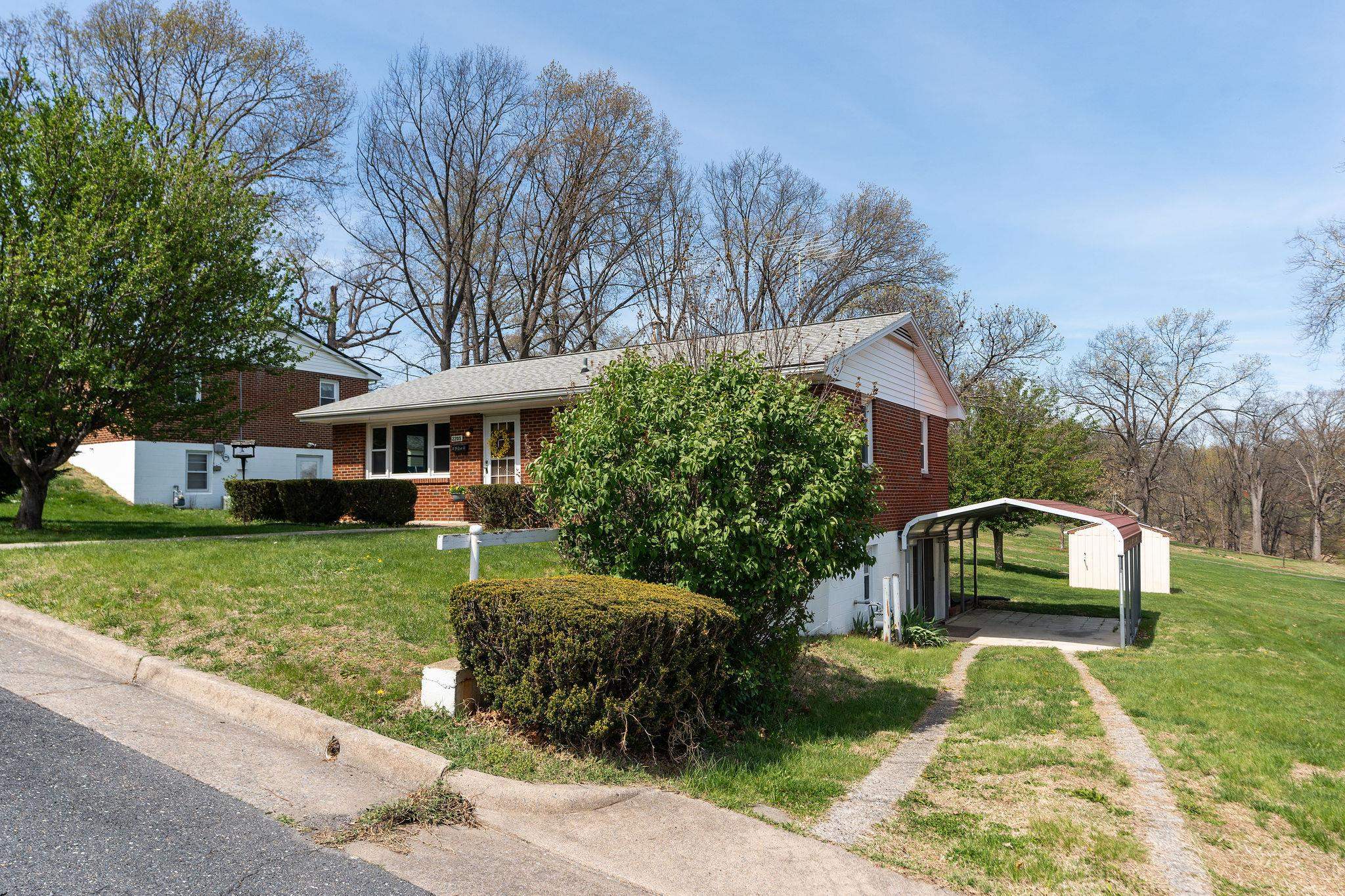 2209 3rd Street Staunton, VA 24401 - Photo 34 of 35 a front view of a house with a yard