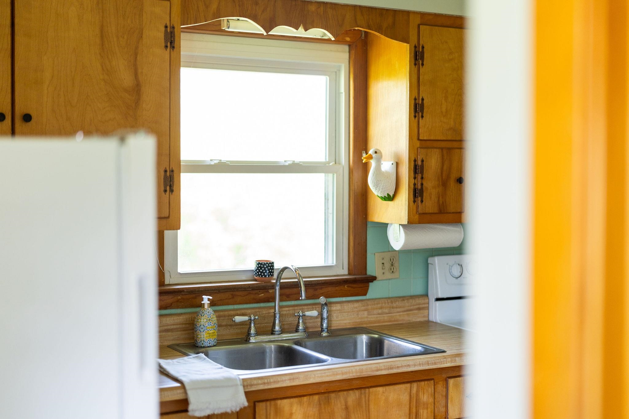 2209 3rd Street Staunton, VA 24401 - Photo 10 of 35 a bathroom with a sink and a large window