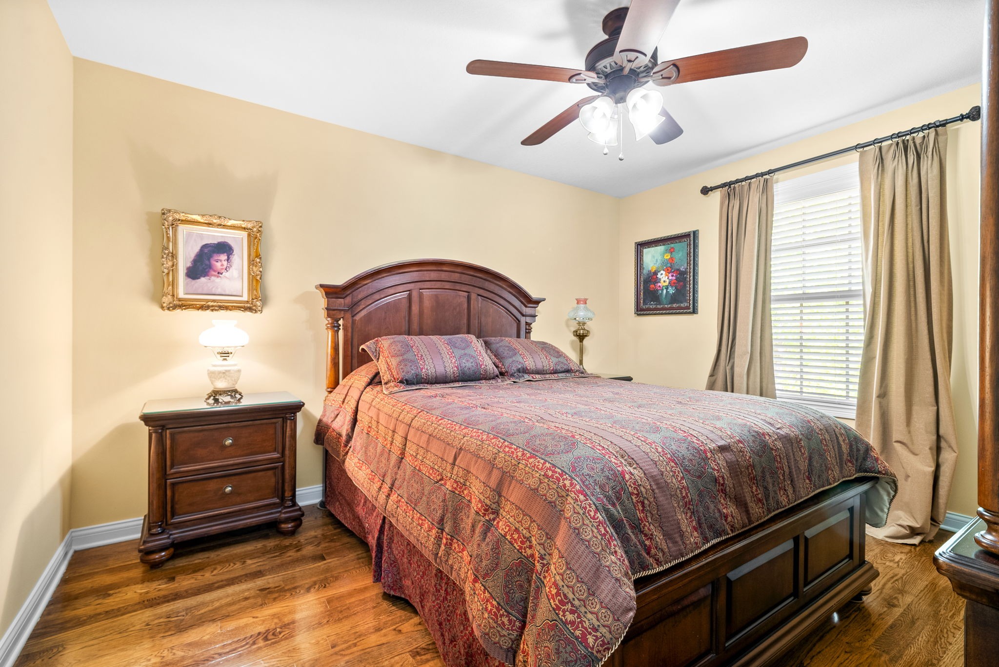 470 Salem Ridge Road Clarksville, TN 37040 - Photo 34 of 69 a bedroom with a bed and a chandelier