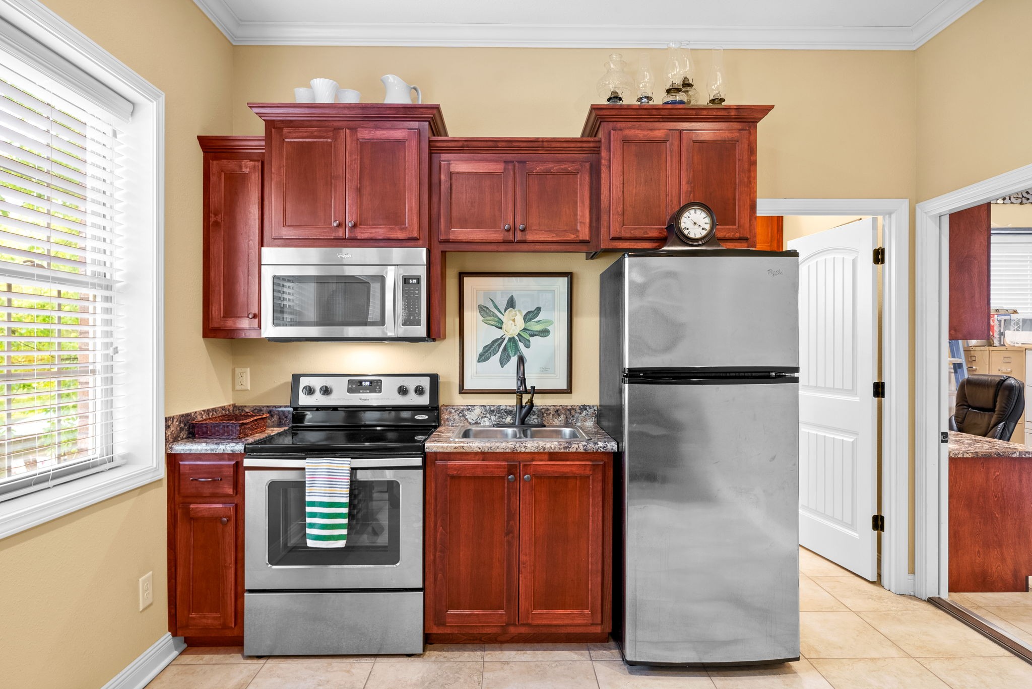 470 Salem Ridge Road Clarksville, TN 37040 - Photo 42 of 69 a kitchen with stainless steel appliances granite countertop a refrigerator a stove and a sink