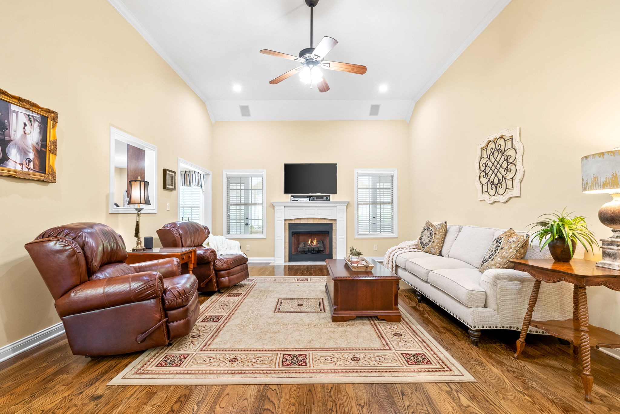 470 Salem Ridge Road Clarksville, TN 37040 - Photo 7 of 69 a living room with furniture a fireplace and a flat screen tv