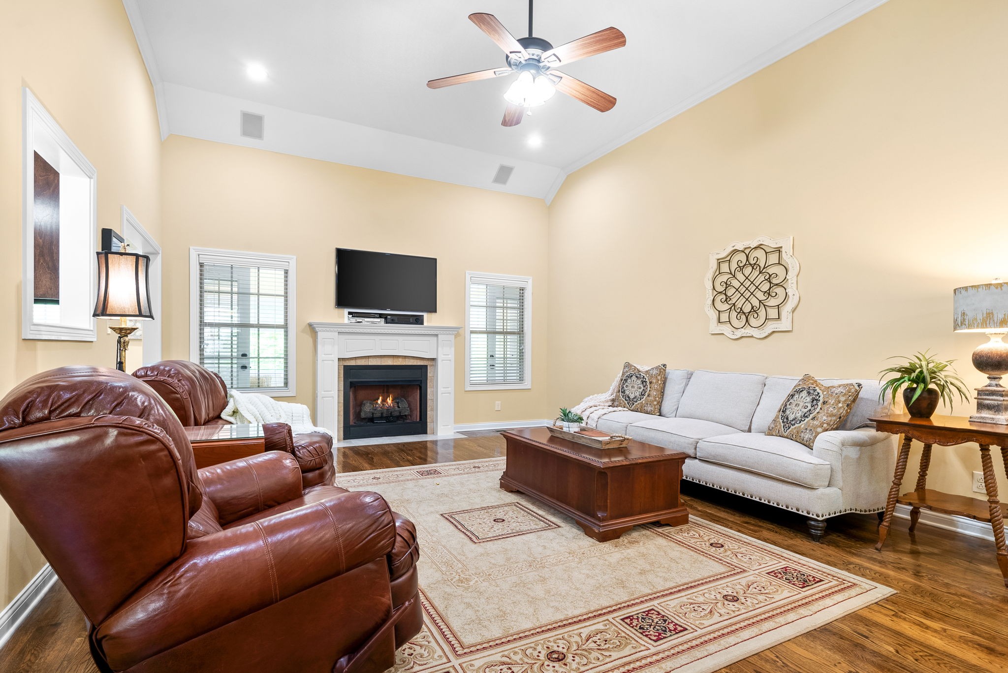 470 Salem Ridge Road Clarksville, TN 37040 - Photo 9 of 69 a living room with furniture a fireplace and a flat screen tv