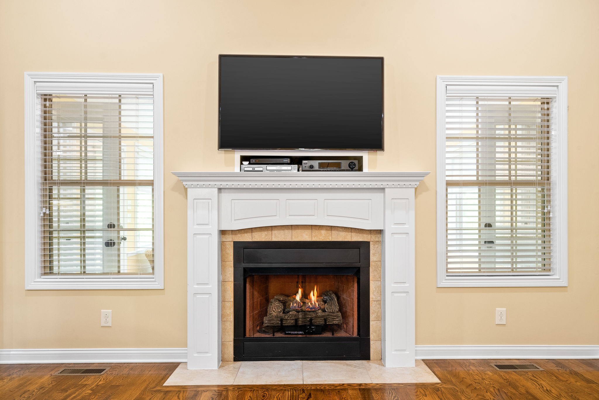 470 Salem Ridge Road Clarksville, TN 37040 - Photo 10 of 69 a living room with a fireplace and a flat screen tv