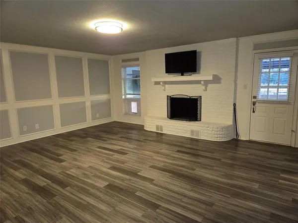 a view of a livingroom with a fireplace