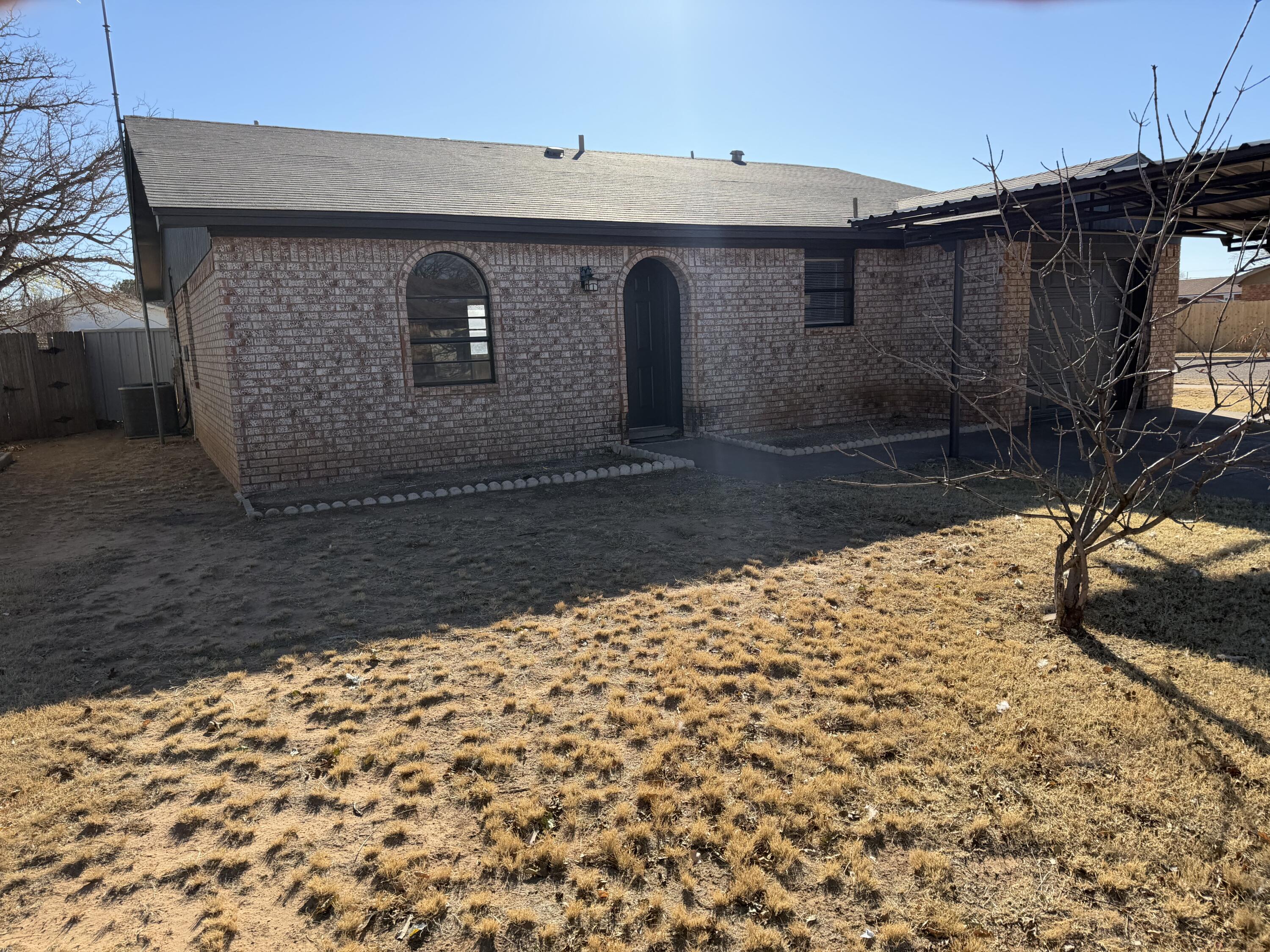 6315 29th Street Lubbock, TX 79407 - Photo 4 of 12 a view of a garage