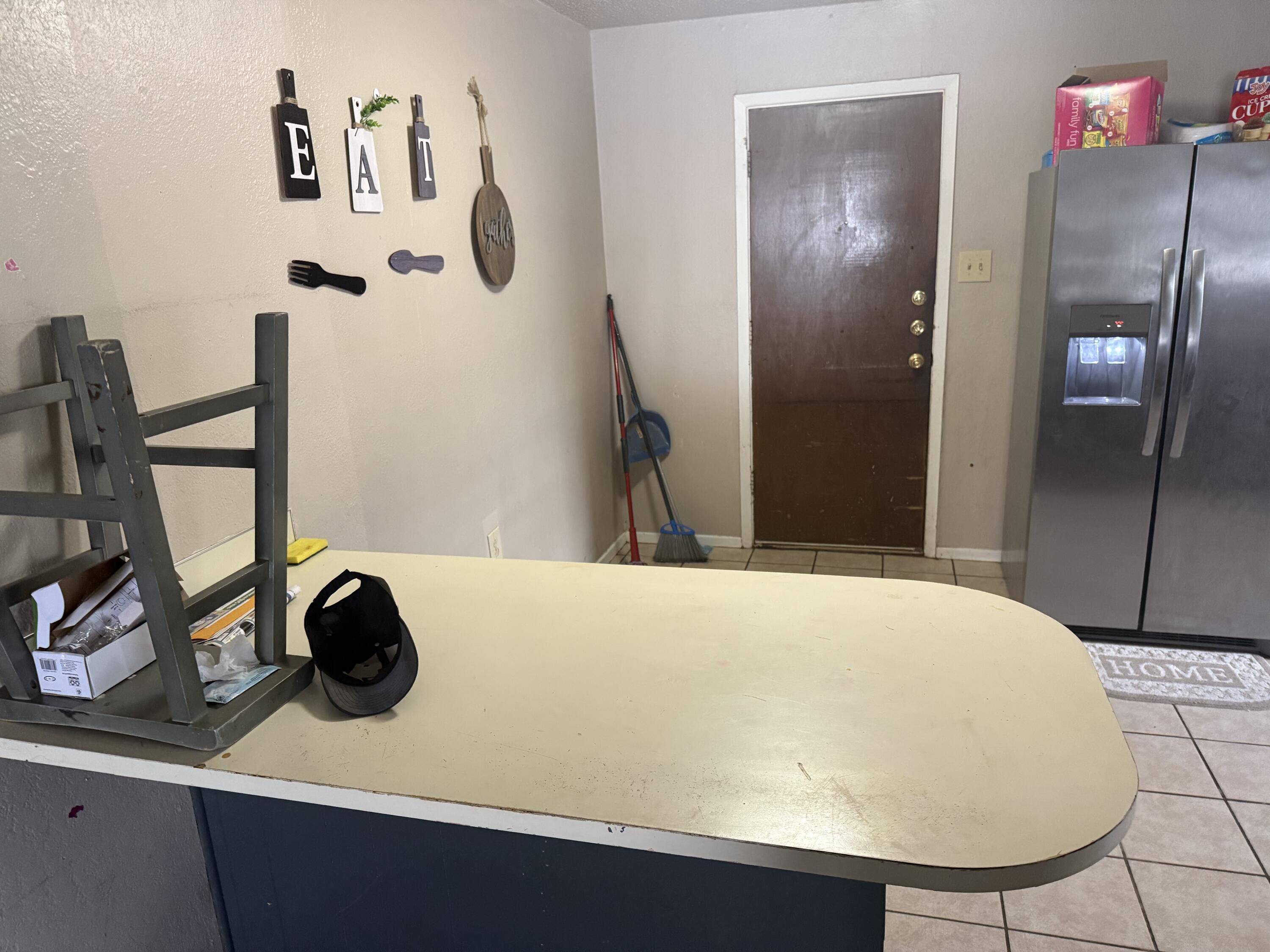 6315 29th Street Lubbock, TX 79407 - Photo 7 of 12 a bathroom with a sink and a mirror
