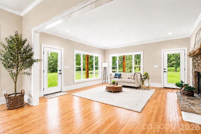 4445 Rowell Road Lancaster, SC 29720 - Photo 12 of 37 a living room with furniture and large windows