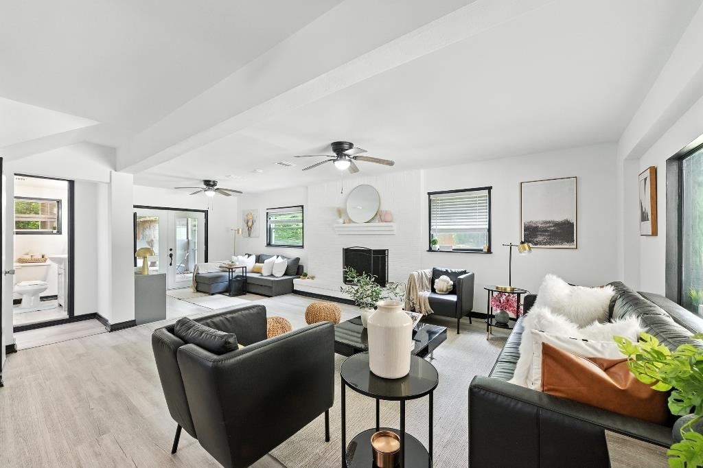 1637 Starratt Road Jacksonville, FL 32218 - Photo 18 of 44 a living room with fireplace furniture and a wooden floor