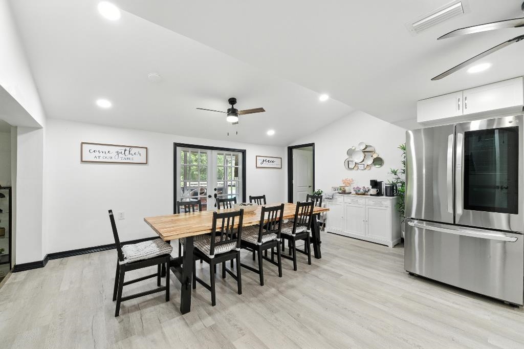 1637 Starratt Road Jacksonville, FL 32218 - Photo 23 of 44 a view of a dining room with furniture and wooden floor