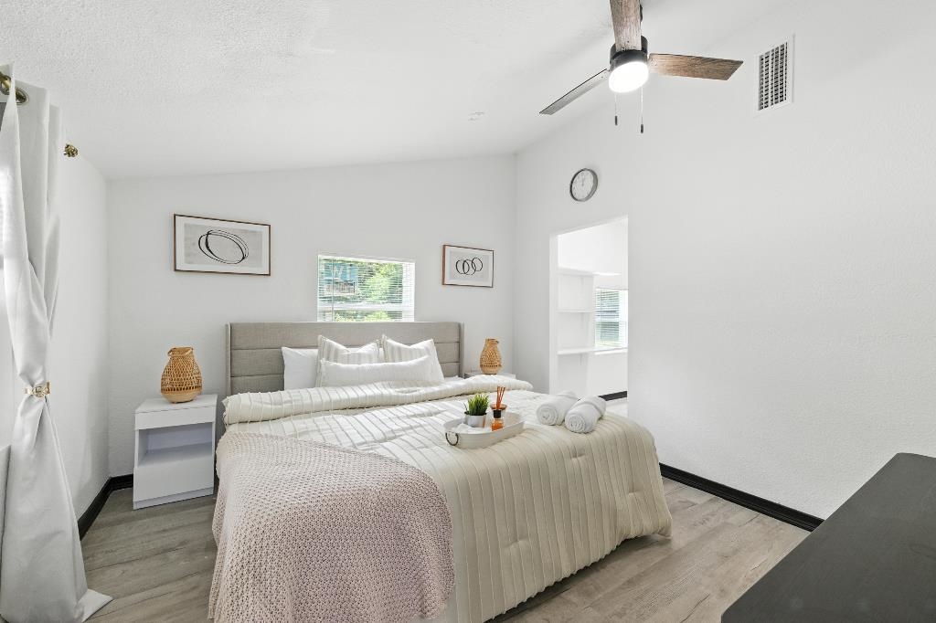 1637 Starratt Road Jacksonville, FL 32218 - Photo 26 of 44 a bedroom with a large bed and a window